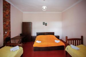 Postel nebo postele na pokoji v ubytování Guest House Iaraji