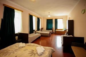 Postel nebo postele na pokoji v ubytování Guest House Iaraji