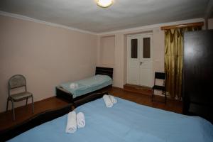 Postel nebo postele na pokoji v ubytování Guest House Iaraji