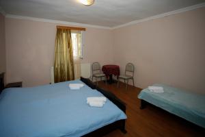 Postel nebo postele na pokoji v ubytování Guest House Iaraji