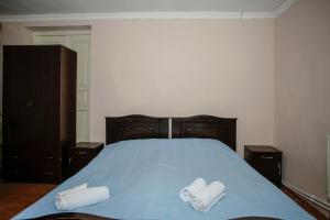 Postel nebo postele na pokoji v ubytování Guest House Iaraji
