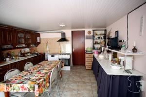Kuchyň nebo kuchyňský kout v ubytování Guest House Iaraji