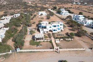 an aerial view of a village with white houses at Ammoudia Studios in Agiassos