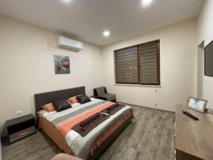 Ένα ή περισσότερα κρεβάτια σε δωμάτιο στο Guest House Marchini