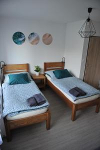 Tempat tidur dalam kamar di Apartmán Luční
