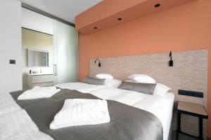 Postel nebo postele na pokoji v ubytování Hotel Diana