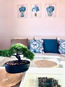 Posezení v ubytování GATU PREMIUM Ático Parra, parking, piscina común, terraza, wifi , " Preferente mayores de 25 años y familias "