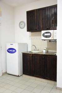 Η κουζίνα ή μικρή κουζίνα στο Hotel Apart El Faro