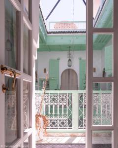 an open door to the balcony of a house at Riad Dar Rabiaa in Rabat