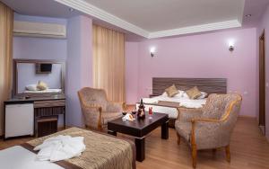 Postel nebo postele na pokoji v ubytování Zel Hotel + 26 fotografií