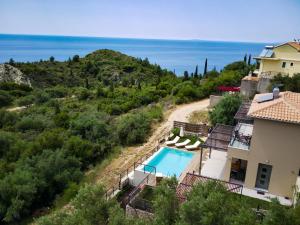 an aerial view of a villa with a swimming pool at euphoria villas - Gaia & Aura in Agios Nikitas