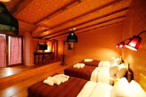 TV a/nebo společenská místnost v ubytování Hotel Memoire Kutaisi