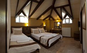 Un pat sau paturi într-o cameră la Assos Behram Special Class Hotel Adults Only
