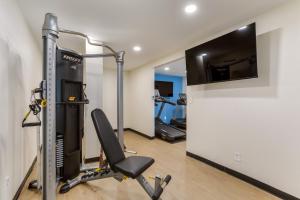 a room with a gym with a treadmill at Red Lion Inn & Suites Nashville Airport in Nashville