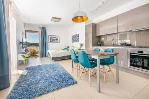 Kuchyň nebo kuchyňský kout v ubytování Villa del Mar Deluxe