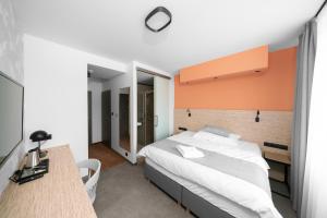 Postel nebo postele na pokoji v ubytování Hotel Diana