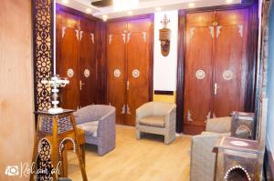 Χώρος καθιστικού στο The location Hotel