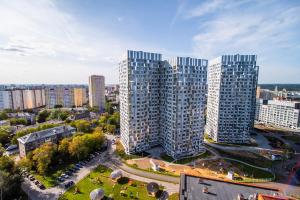 an aerial view of a city with tall buildings at K&K Apartments Gulliver 468 in Perm