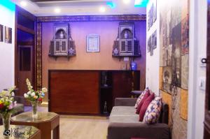 Χώρος καθιστικού στο The location Hotel
