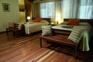 Ein Bett oder Betten in einem Zimmer der Unterkunft Selva Verde Lodge