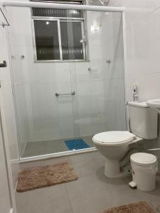 a bathroom with a shower and a toilet at Copacabana Rio praia 6 in Rio de Janeiro