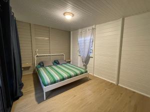 Letto o letti in una camera di Villa ATOLA