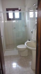 Ванная комната в JURERÊ INTERNACIONAL SUÍTES