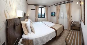 Postelja oz. postelje v sobi nastanitve Assos Behram Special Class Hotel Adults Only