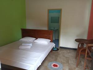 Leopard Rock Family Rest客房内的一张或多张床位
