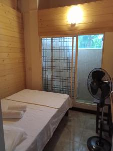 Leopard Rock Family Rest客房内的一张或多张床位