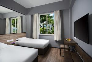 Katil atau katil-katil dalam bilik di 有集城市客栈锦绣中华店Unijoy Cityinn Splendid China Shenzhen
