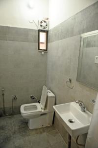 Koupelna v ubytování Patnimal Guesthouse + 37 fotografií