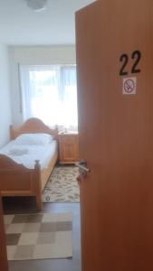 A bed or beds in a room at Lippborger-Hof