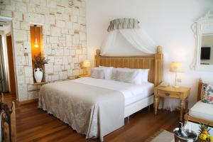 Кровать или кровати в номере Cocos The Club Solto