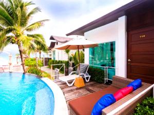 Bazén v ubytování The Samui Beach Resort nebo v jeho okolí