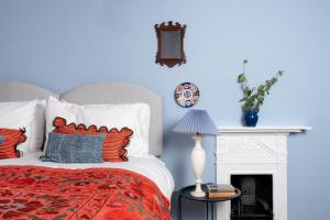 Llit o llits en una habitació de Finest Retreats - North Lodge