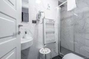Koupelna v ubytování Hotel Argentina