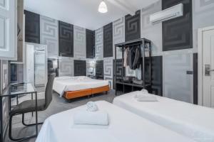 Postel nebo postele na pokoji v ubytování Hotel Argentina