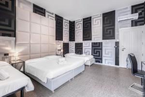 Postel nebo postele na pokoji v ubytování Hotel Argentina