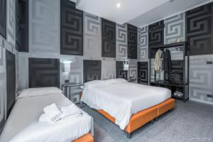 Postel nebo postele na pokoji v ubytování Hotel Argentina