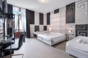 Postel nebo postele na pokoji v ubytování Hotel Argentina