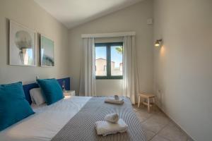 Postel nebo postele na pokoji v ubytování GT Beach