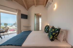 Postel nebo postele na pokoji v ubytování GT Beach