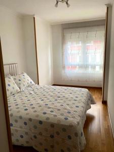 Łóżko lub łóżka w pokoju w obiekcie Piso Vista os castelos