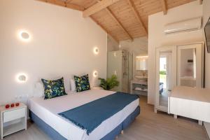 Postel nebo postele na pokoji v ubytování GT Beach