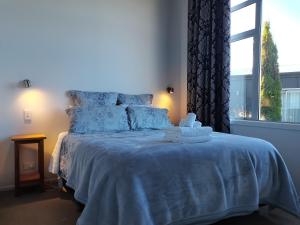 Postel nebo postele na pokoji v ubytování Three Rivers 2 Bedroom Cottage