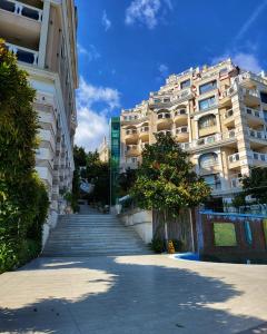 a stairway leading to a large building at Elegantz Apartments LaMer in Varna City