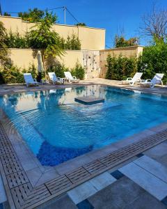 The swimming pool at or close to Elegantz Apartments LaMer
