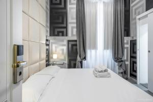 Postel nebo postele na pokoji v ubytování Hotel Argentina