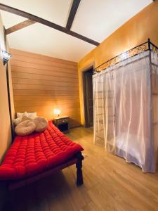 Postel nebo postele na pokoji v ubytování Le Chalet d'Etienne